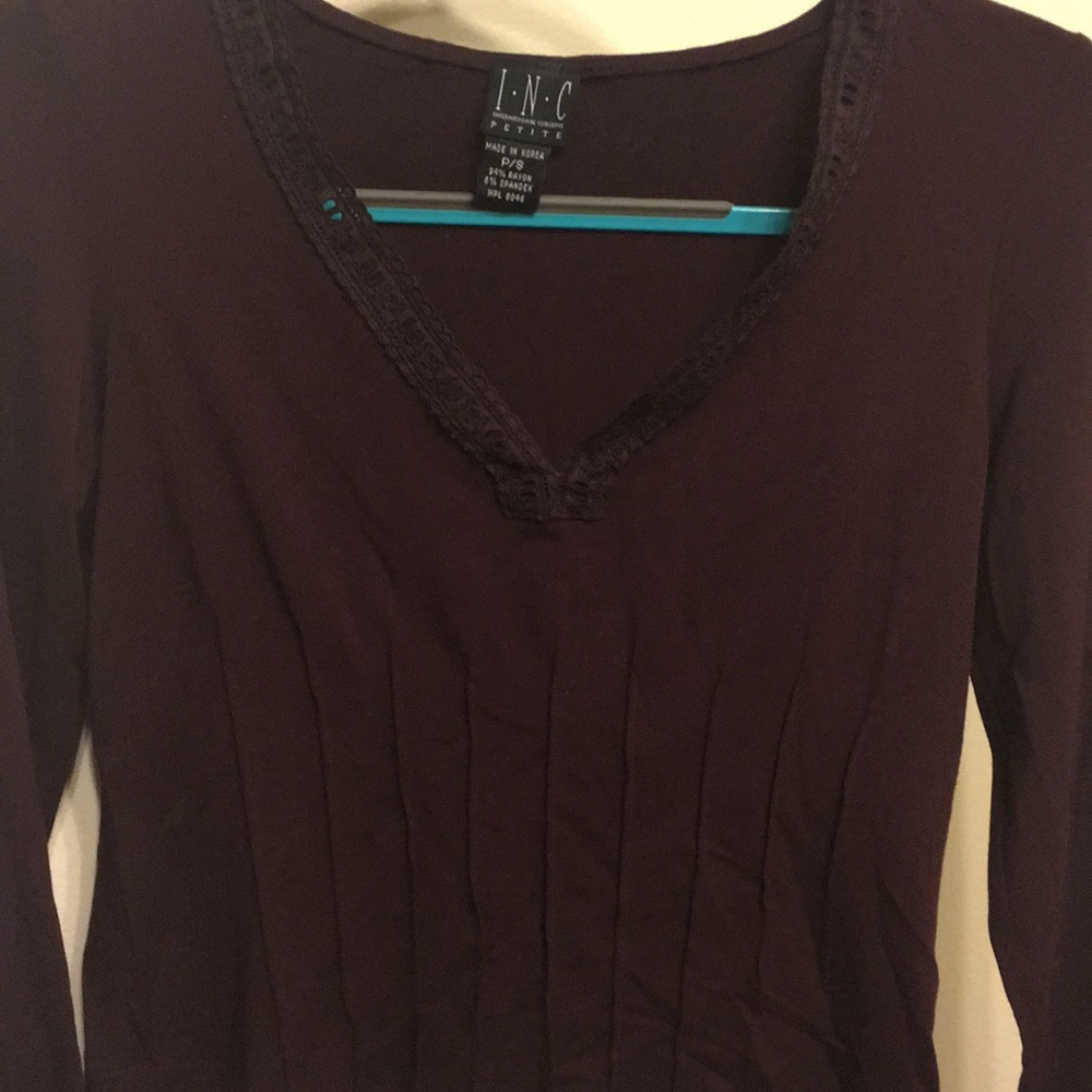 Ruffle detail pleated long sleeve tee/ blouse.